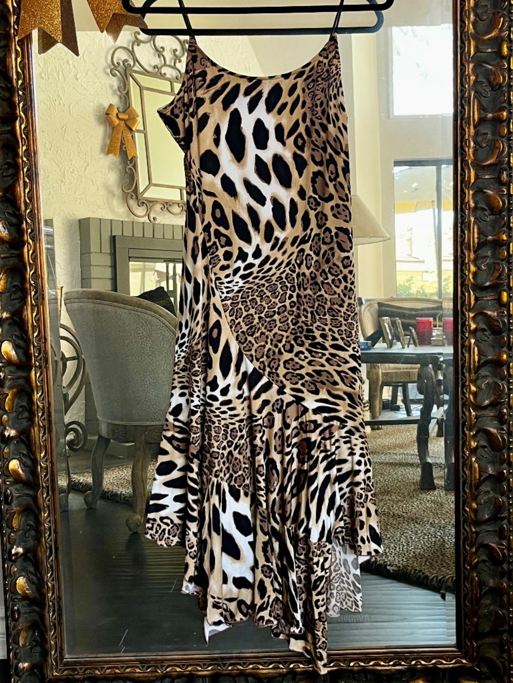 Never worn animal print slip dress with uneven him
